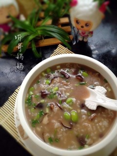  家常菜— —鸡血香菇毛豆粥 第9步